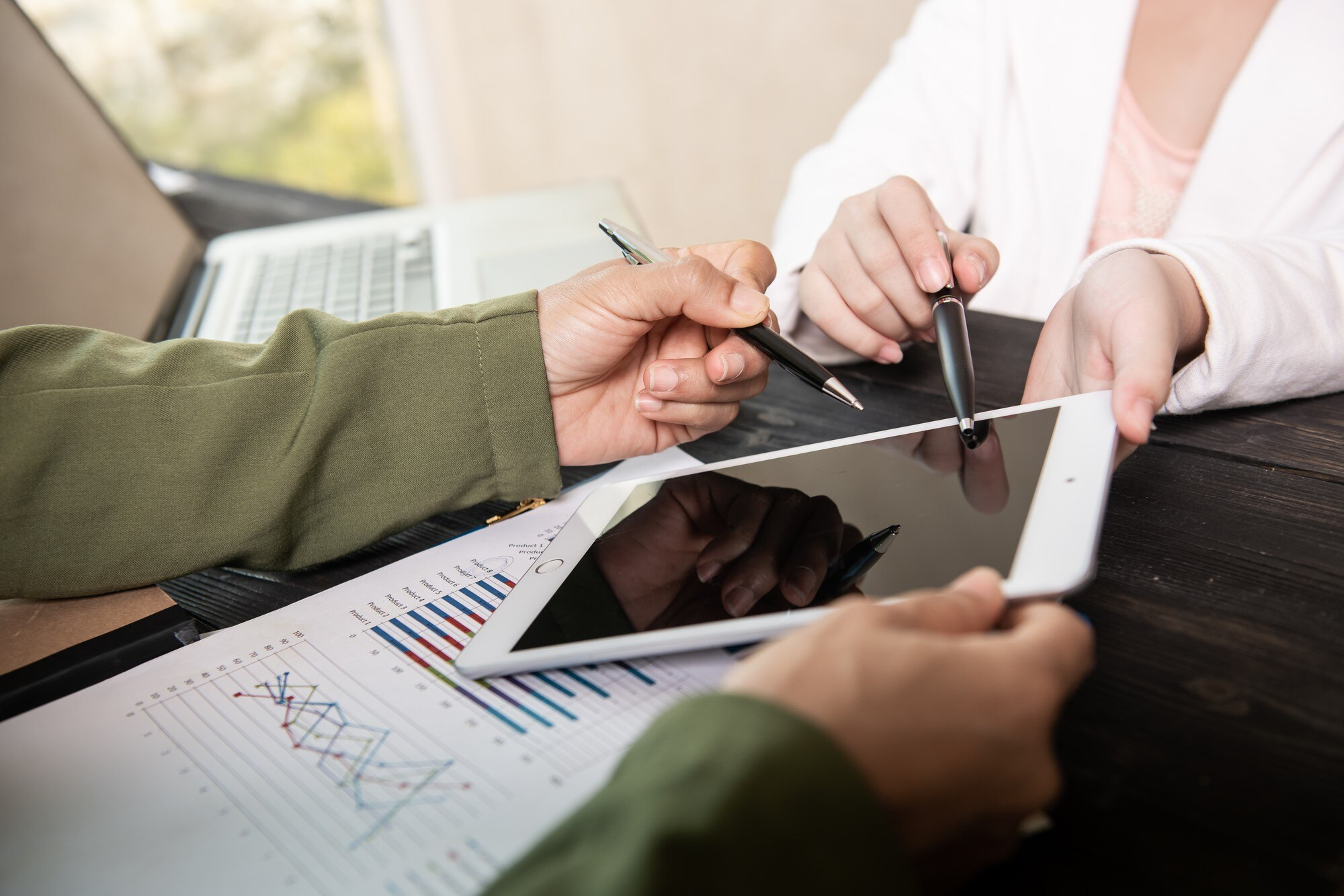 Business professionals analyzing data